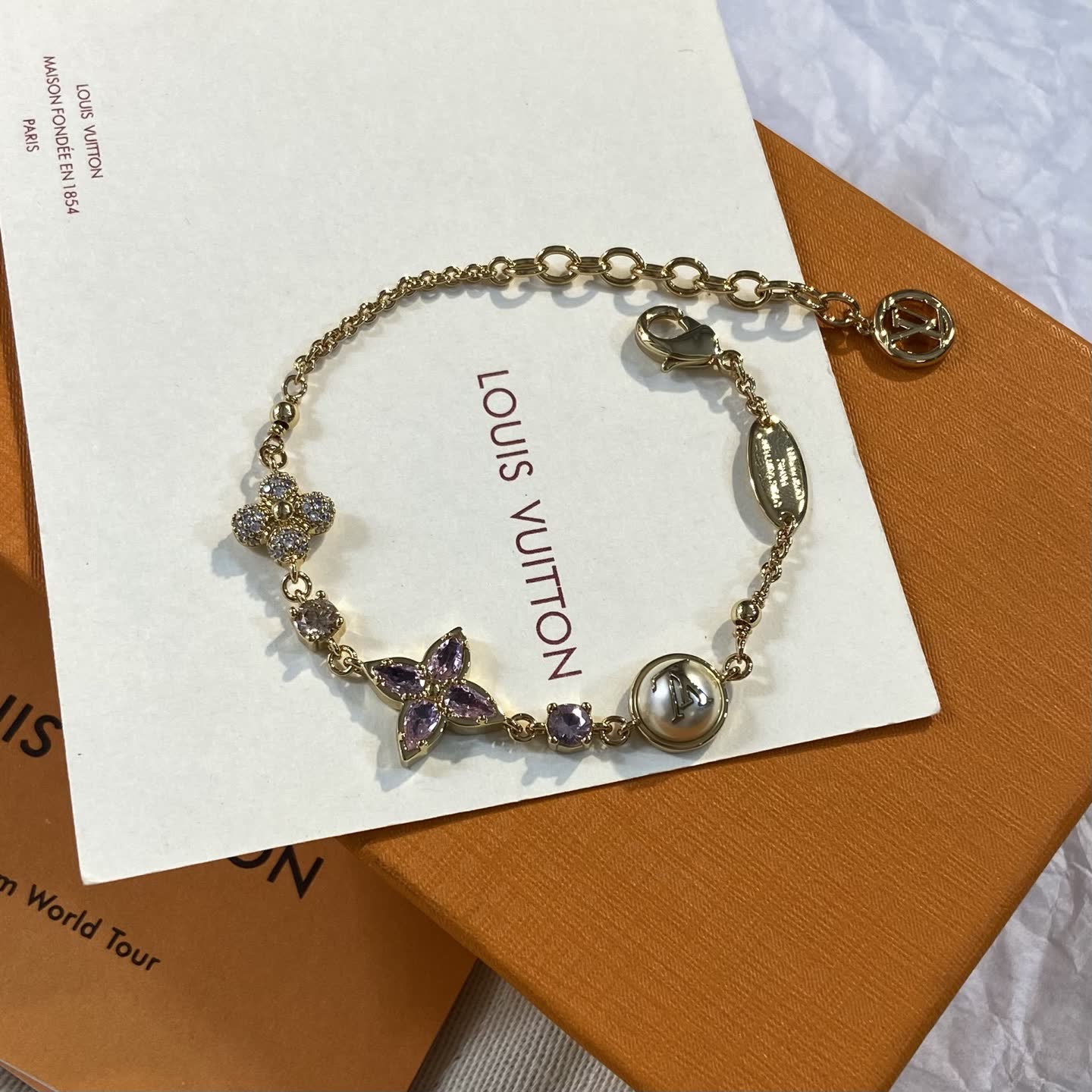 Louis Vuitton Gold Tone Bracelet with Purple Stones-LS0744